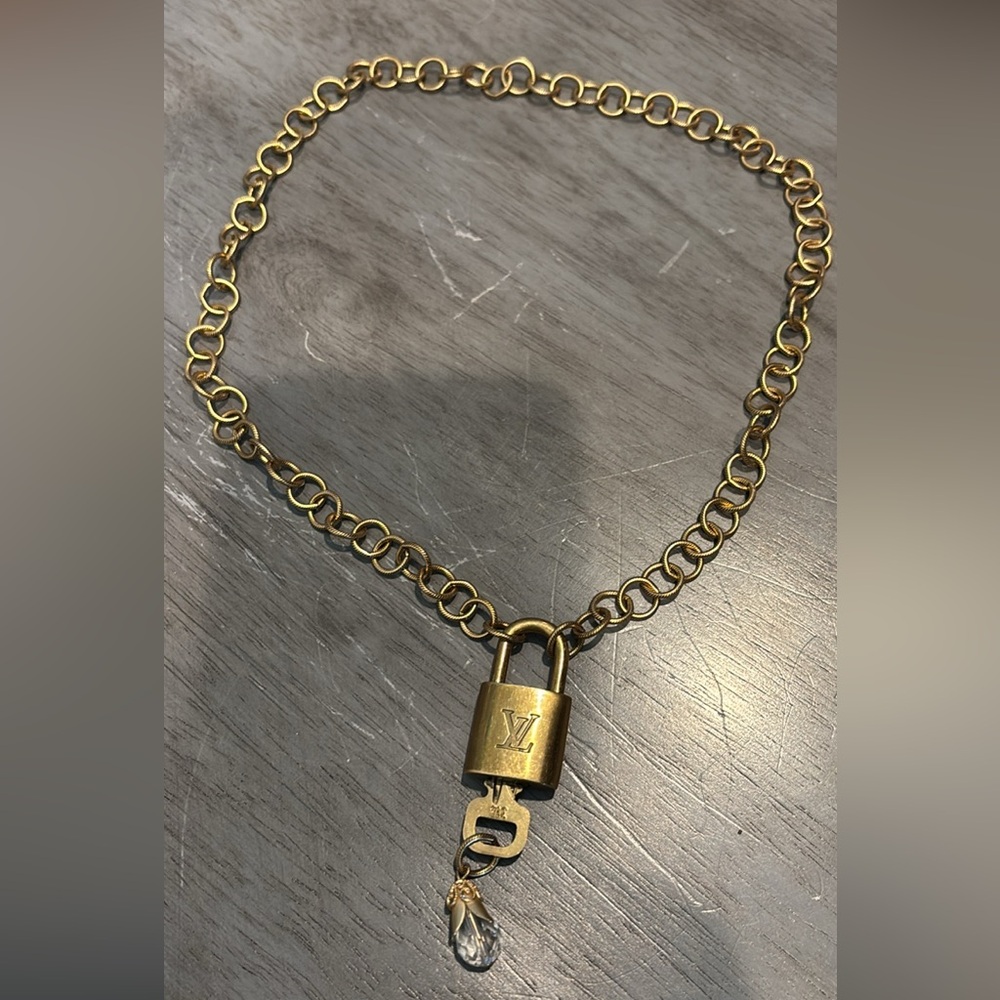 Louis Vuitton lock on brass chain with crystal accent Necklace!